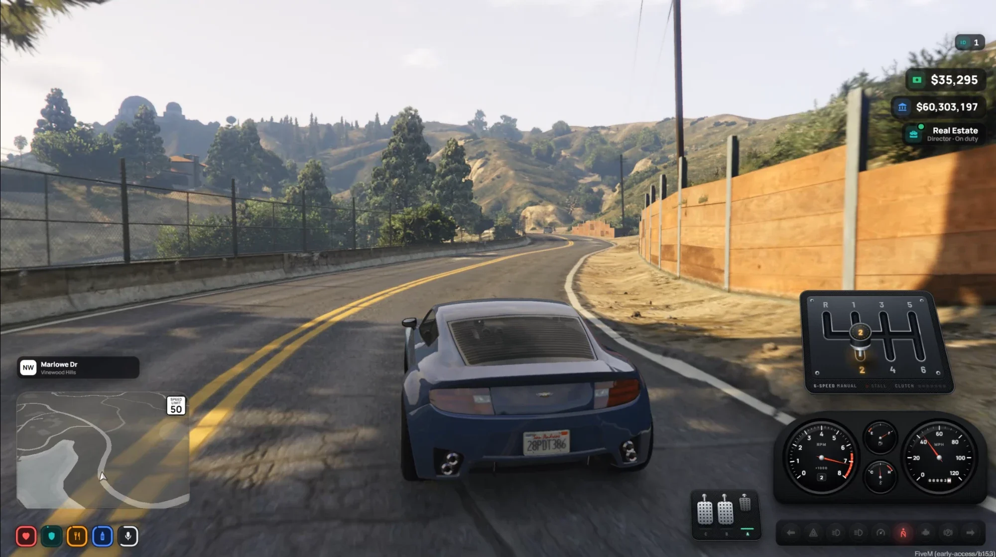 A blue sports car on a hill road in second gear. The gear gate and pedals sit at the right of the screen, above bucky-hud's gauges.